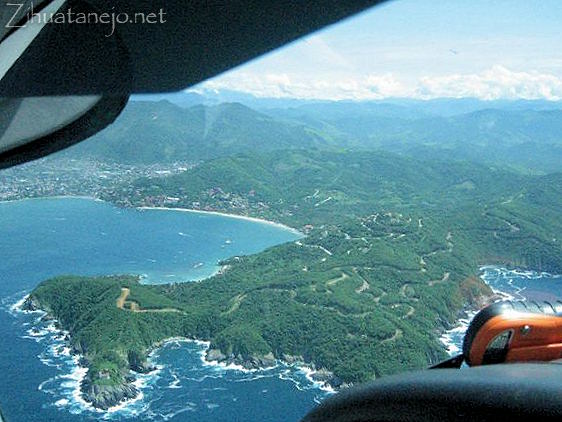 aerial photo of new roads on hills above Las Gatas and La Ropa beaches
