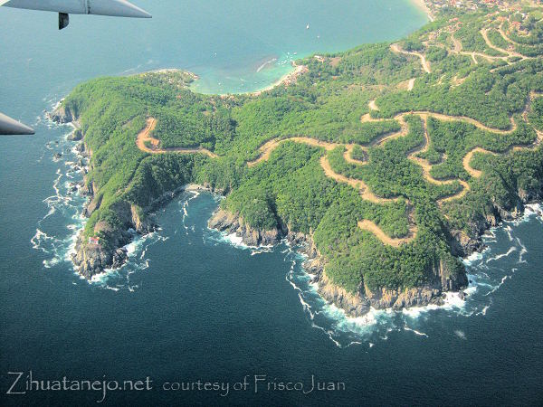 aerial photo of new roads on the hills above Las Gatas beach to the lighthouse